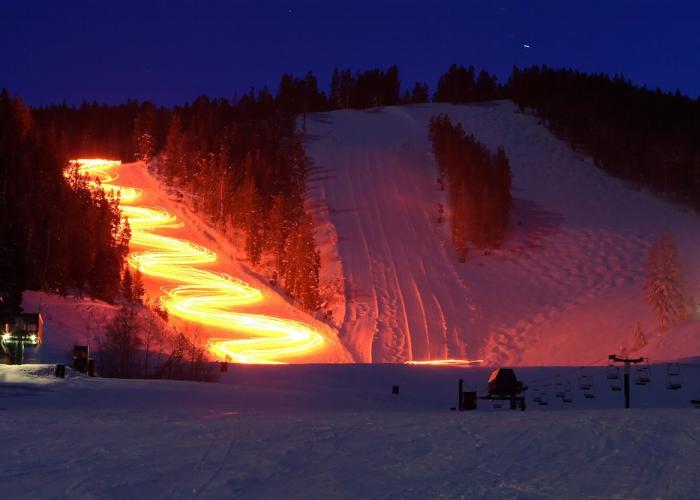 time lapse of lights up a ski mountain