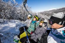 friends on a ski lift