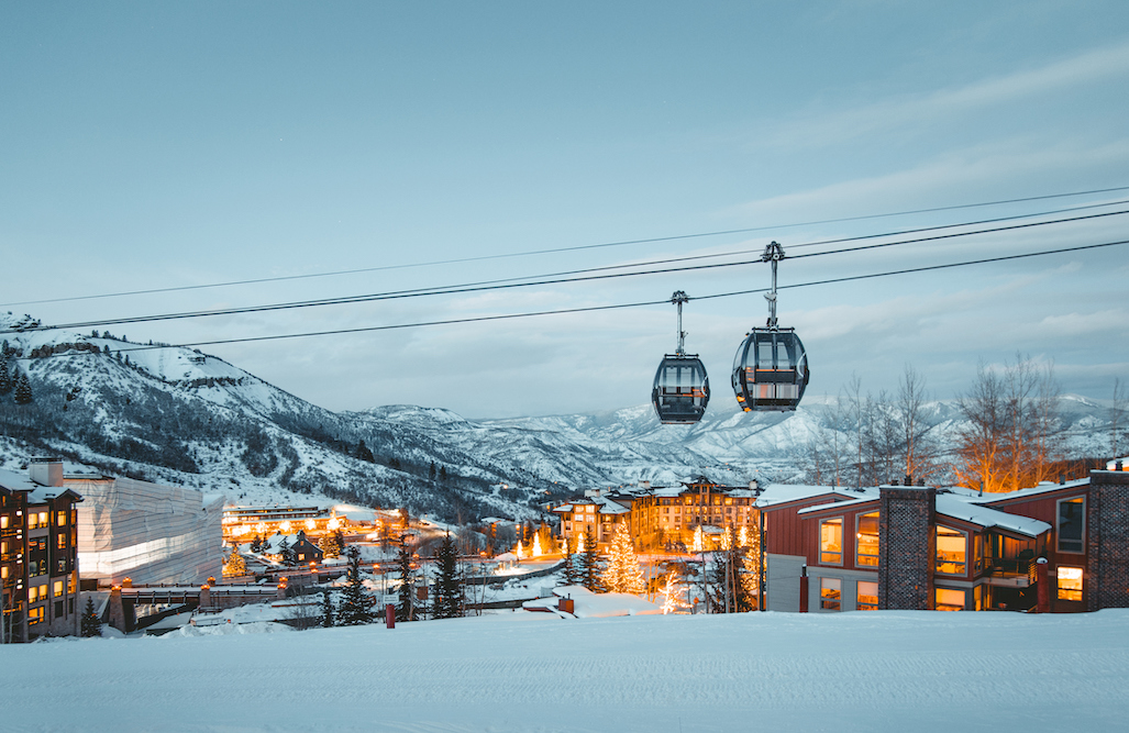 Snowmass village with view of gondola in winter in Aspen