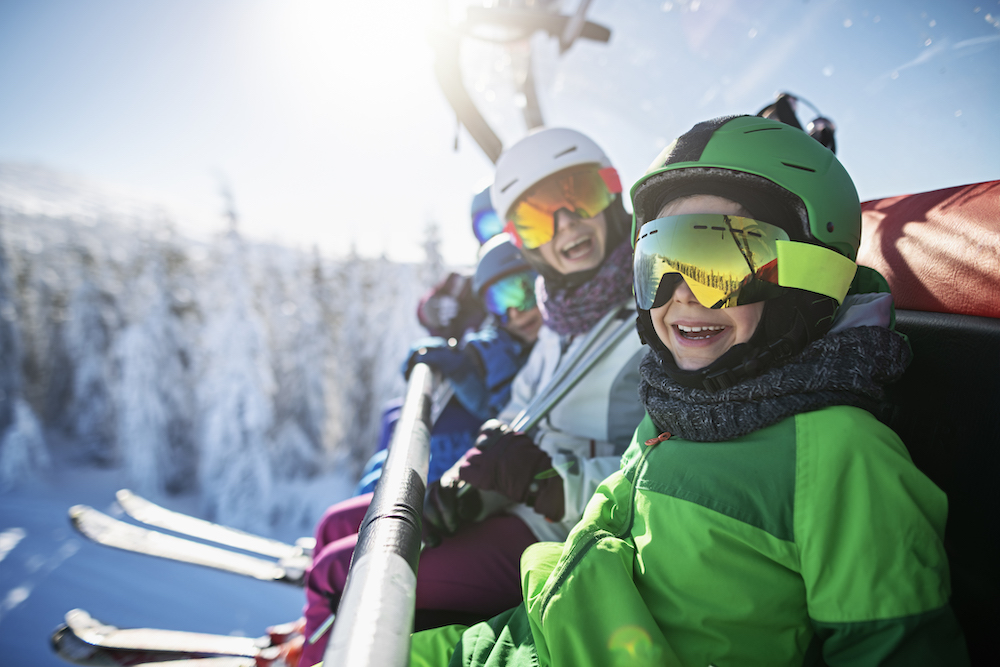 family on ski lift